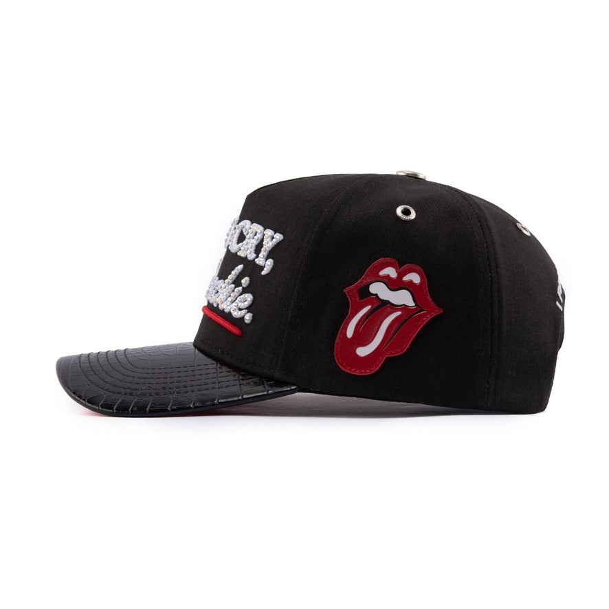 Black Goddess V3 side: red leather lips-and-tongue patch and silver eyelets