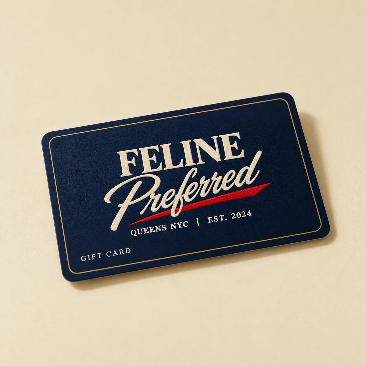 Feline Preferred gift card: navy card with the cream Feline Preferred logo, red underline and gold border